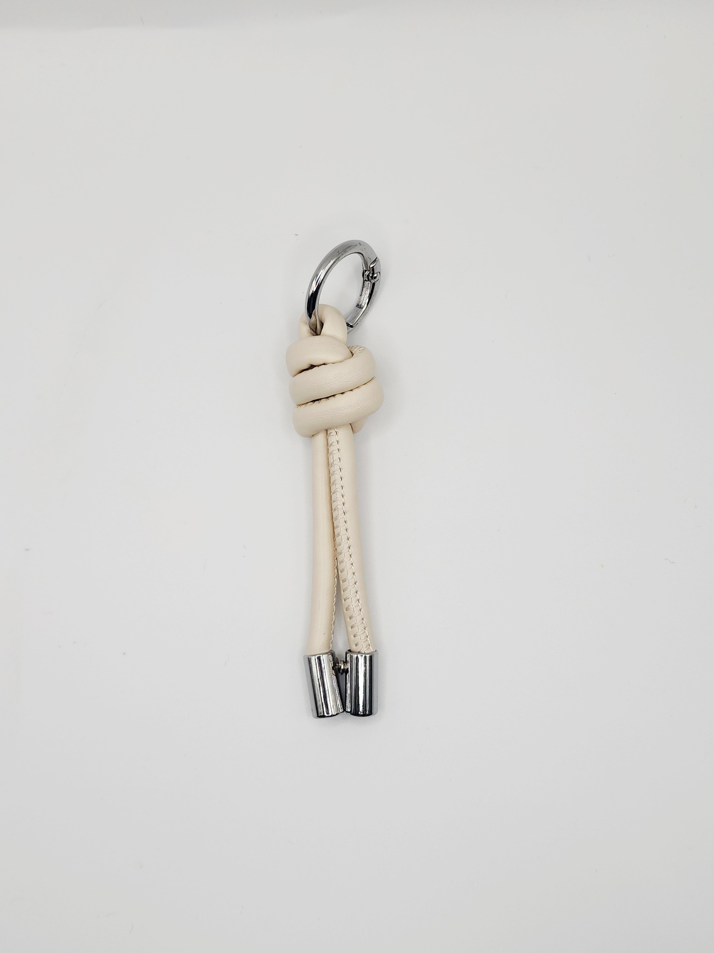 The Knot Cord Charm | Sleek Leather & Polished Chrome