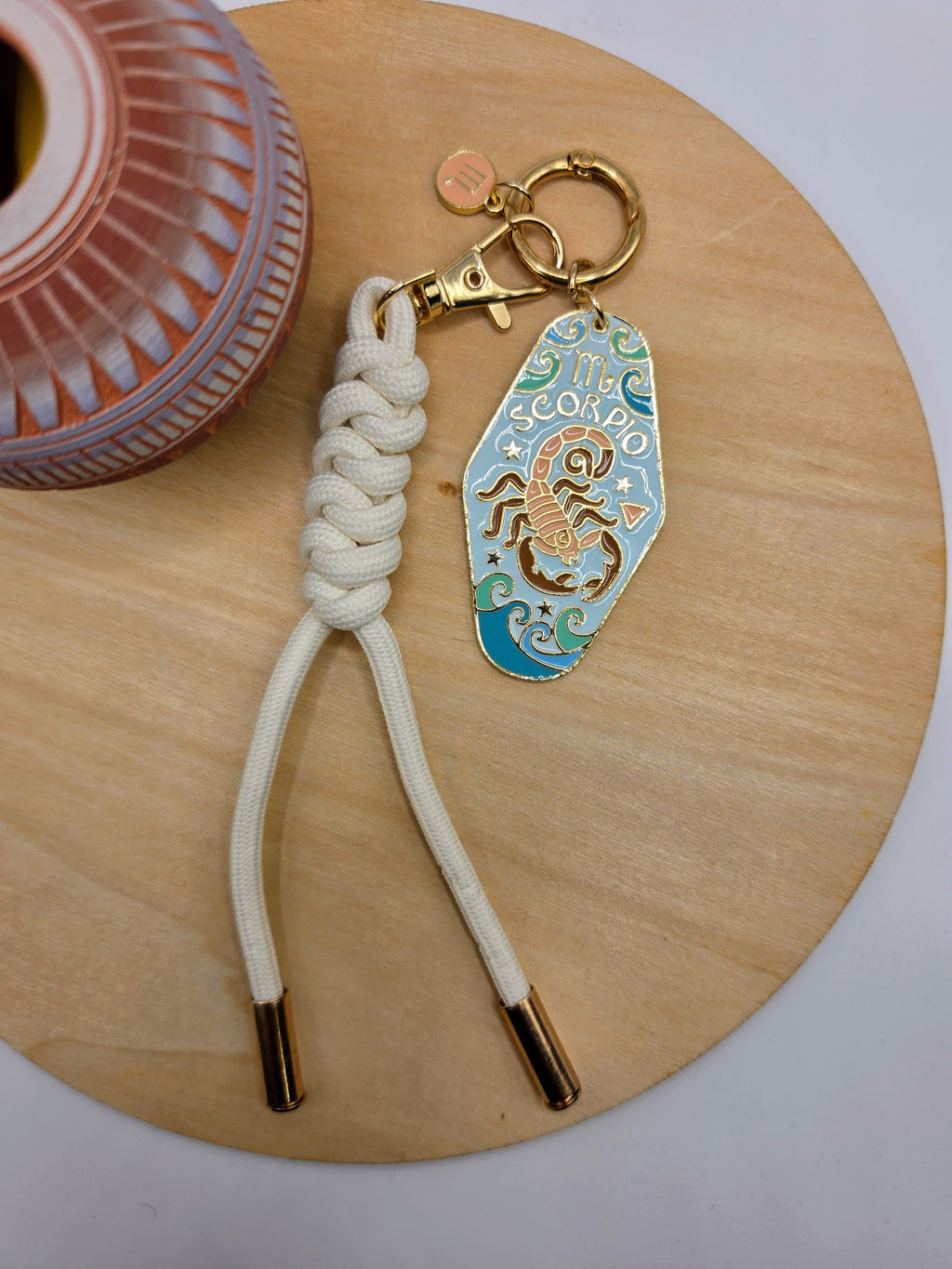 Keychain with a colorful tag on a wooden surface