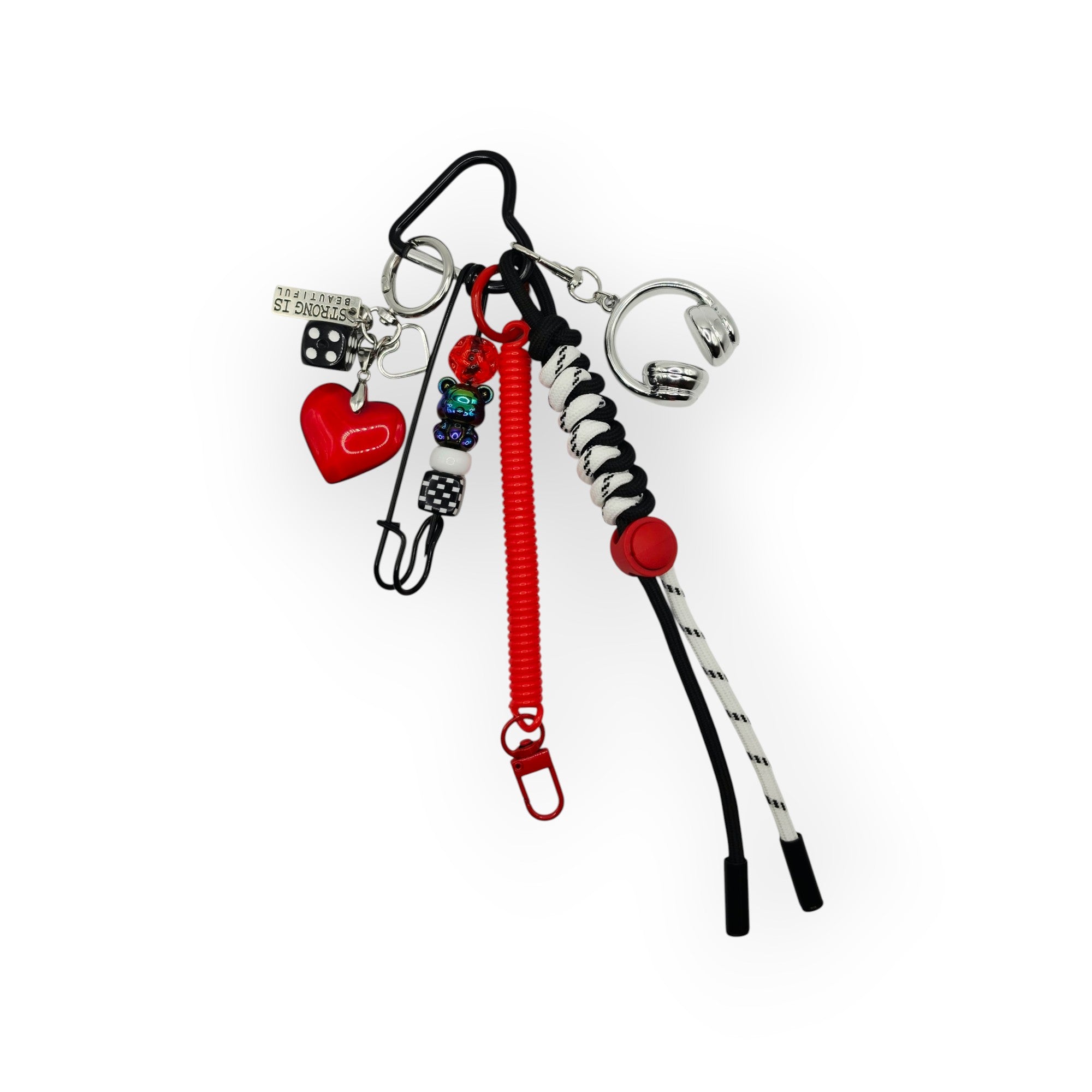 Maximalist red heart and headphone safety pin bag charm with black heart clip, checker beads, die charm, and paracord