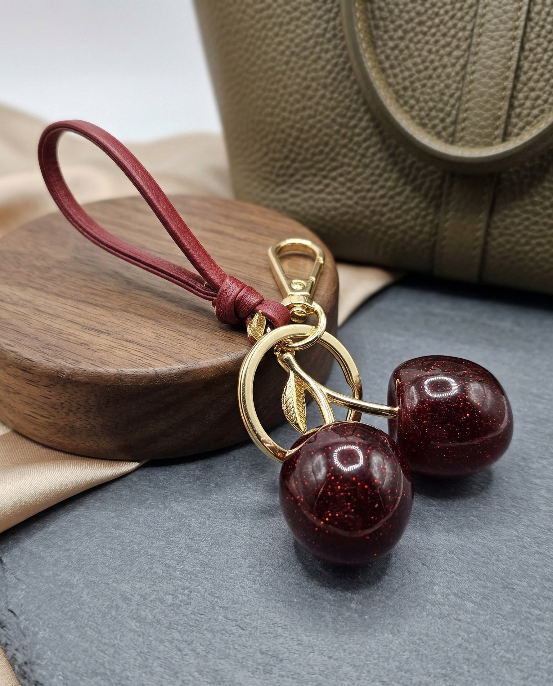 The "Cherry On Top" High-Gloss Bag Charm