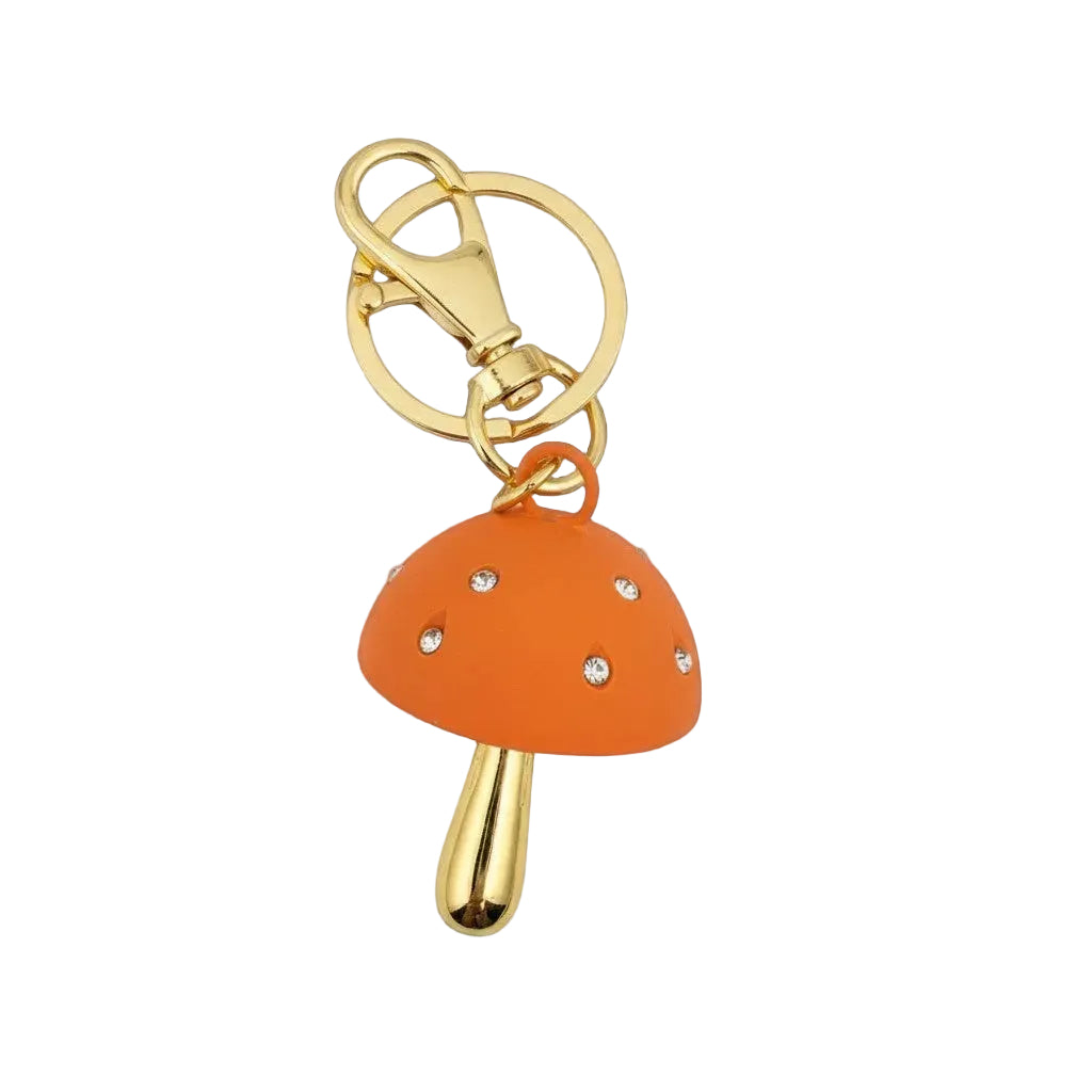 Enchanted Rhinestone Mushroom Bag Charm keychain with gold-tone stem, rhinestone cap, lobster clasp, and split key ring