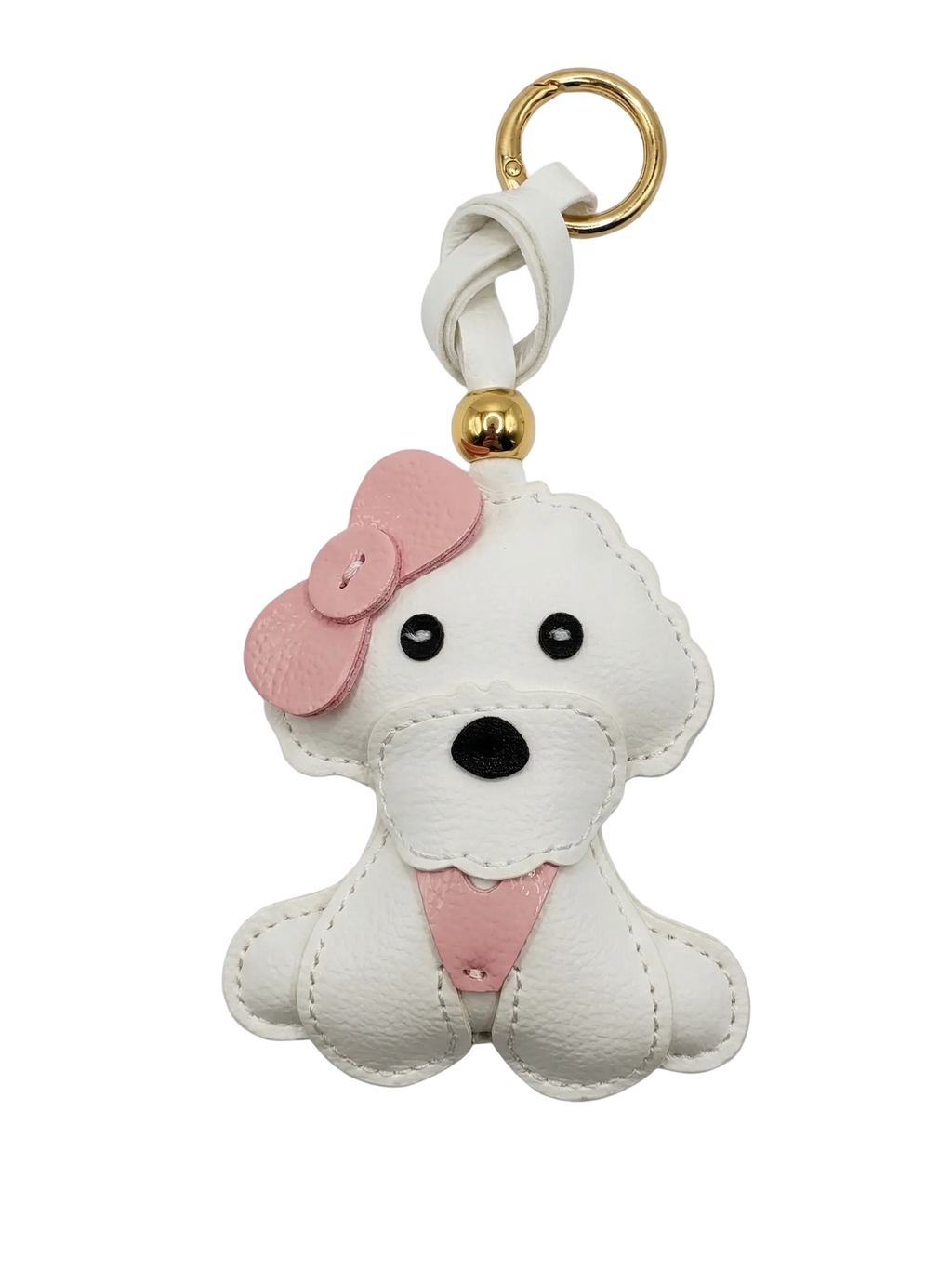 White dog-shaped keychain with a pink bow on a white background