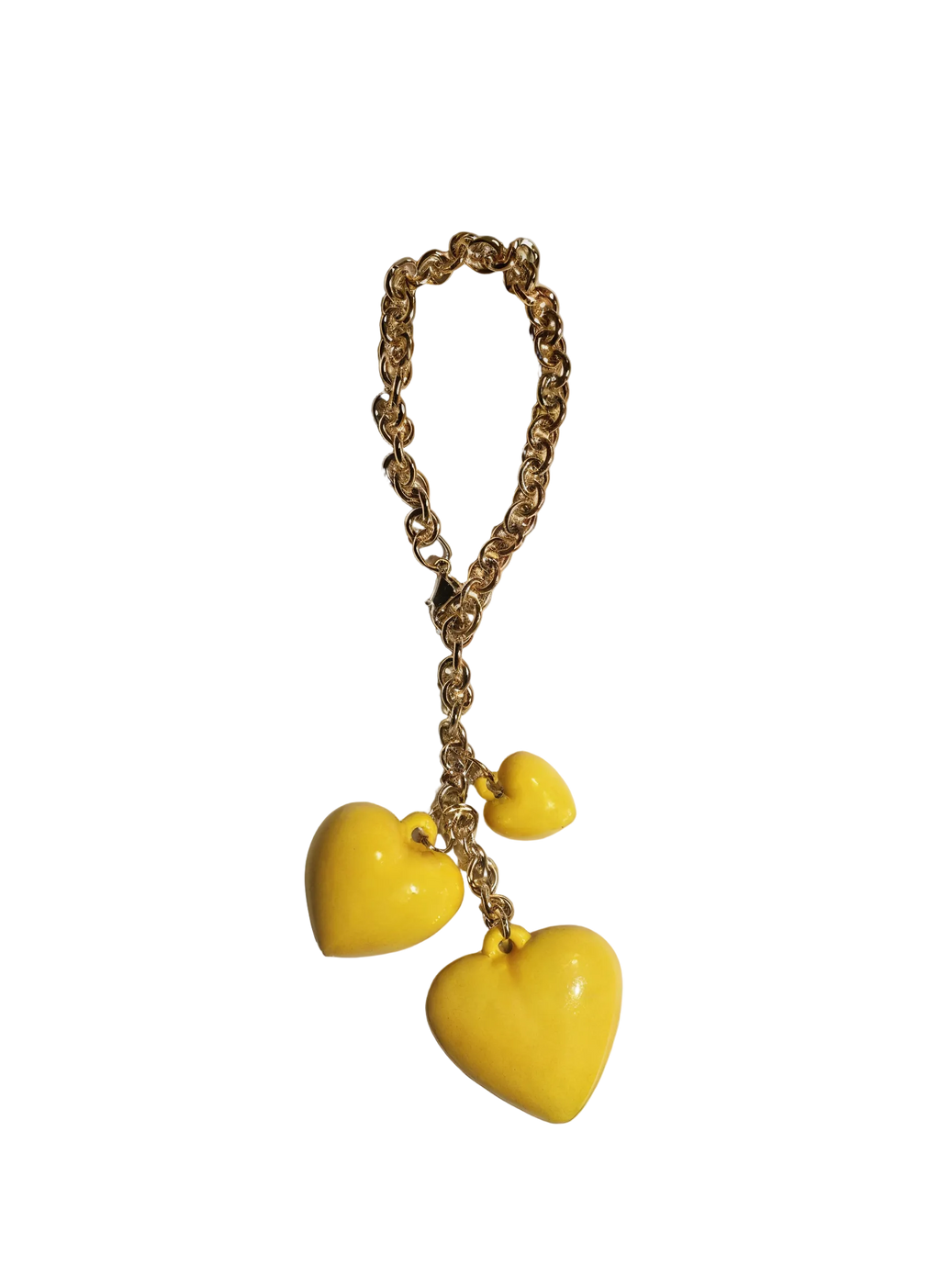 Gold chain with yellow heart-shaped pendants on a white background
